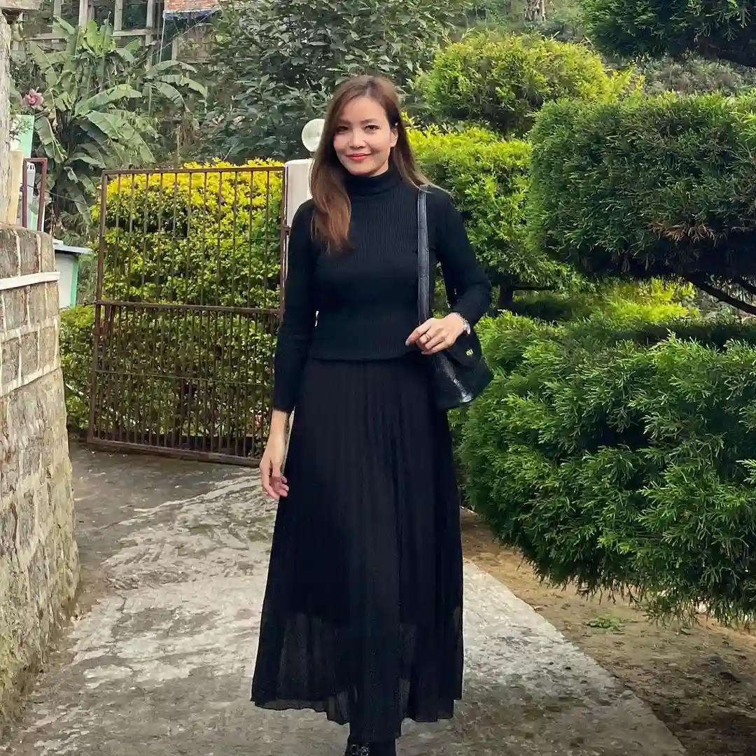Effortless Elegance Minimalist Black Ensemble for a Subtle Festive Look