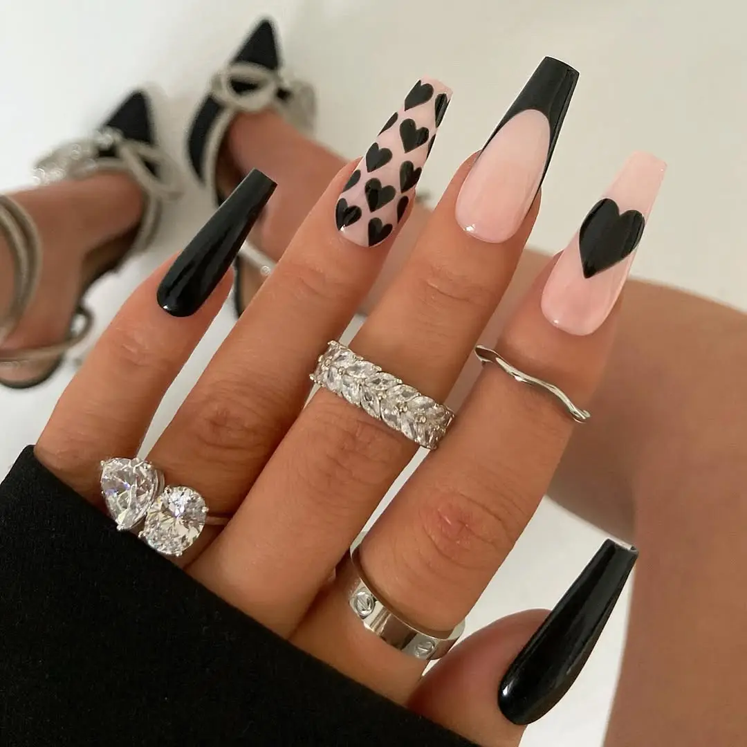 Heartfelt Glam: Black and White Nail Art for the Bold Romantic