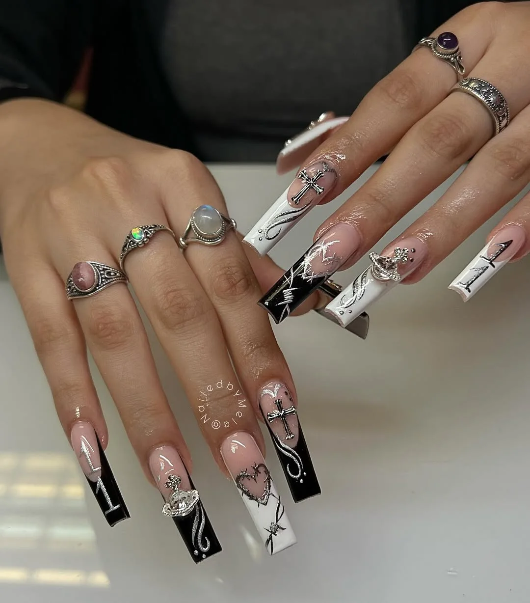 Gothic Glamour Black and White Nails with a Statement Edge