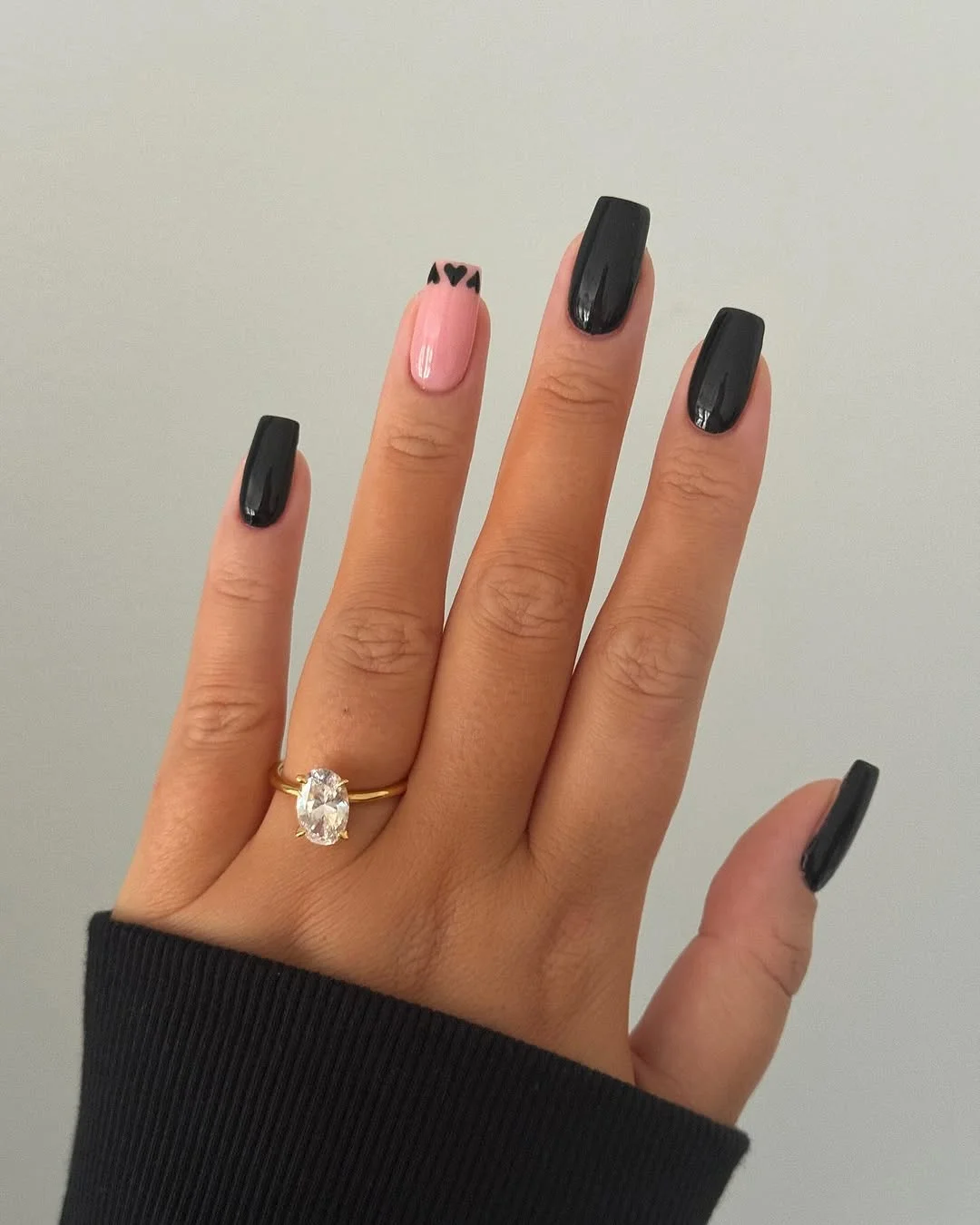 Modern Romance: Black and Pink Nail Art for a Minimalist Statement