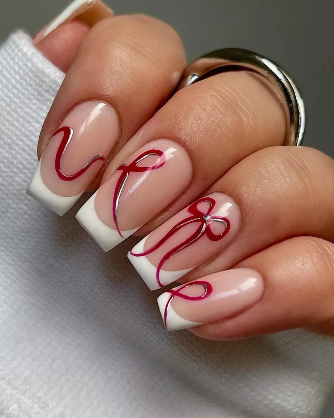 Ribbon-Tied Elegance Minimalist French Tips with a Playful Twist