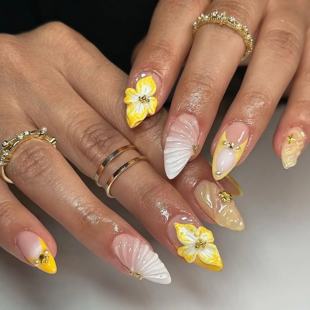 Golden Blooms: Sculptural Yellow Nail Art with Floral Drama
