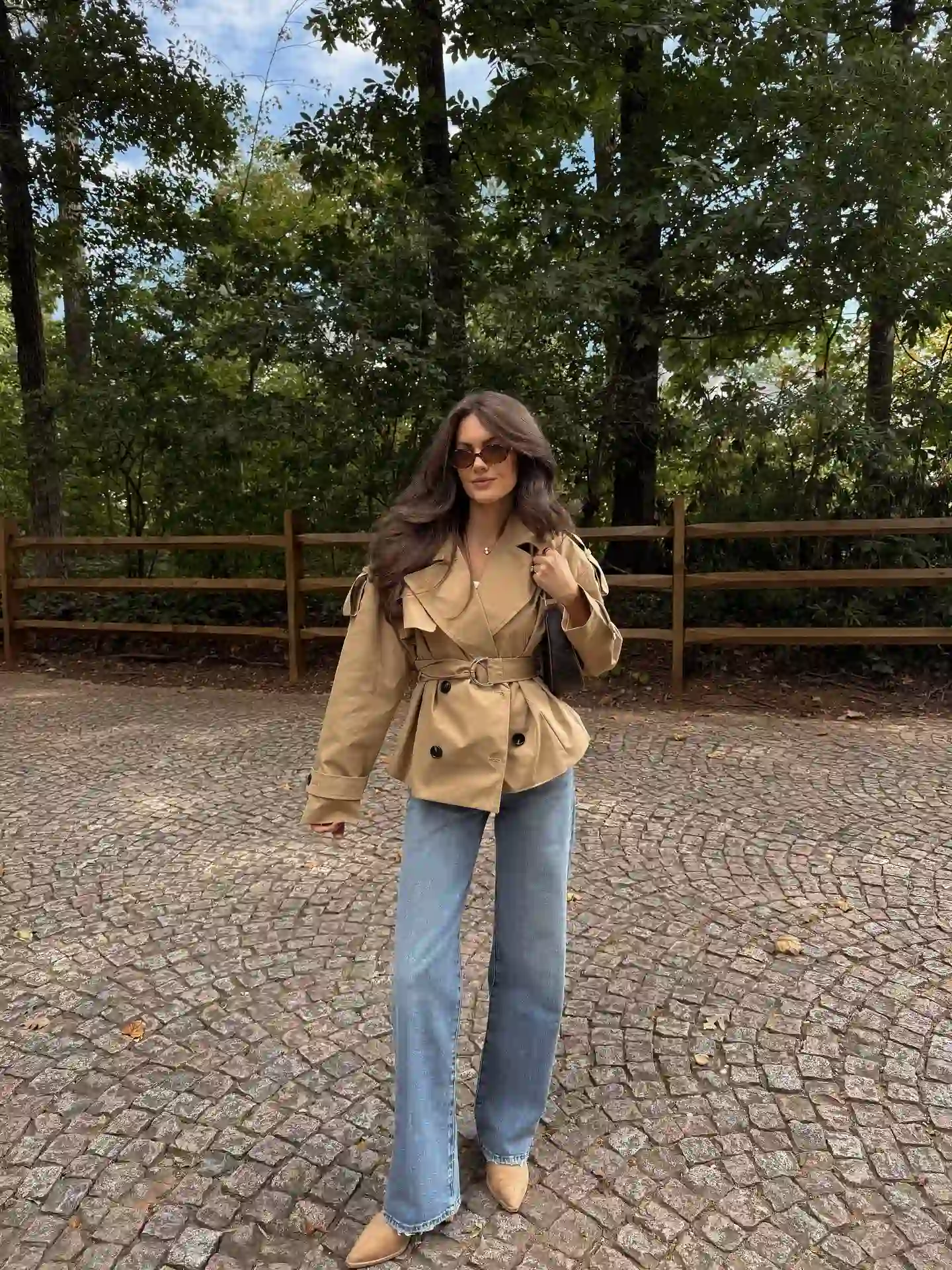 Belted Trench Coat With Straight Jeans Creates a Defined Fall Silhouette