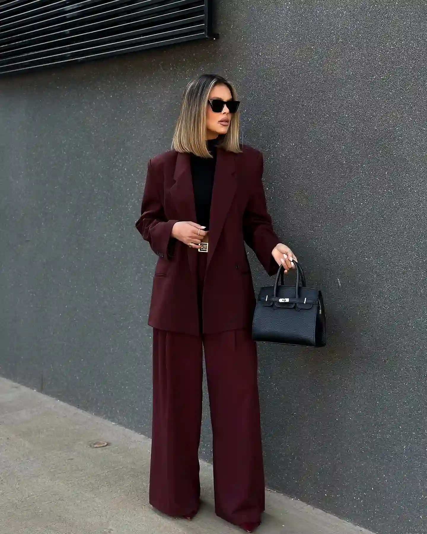 Make Burgundy Look Tailored With a Matching Pantsuit