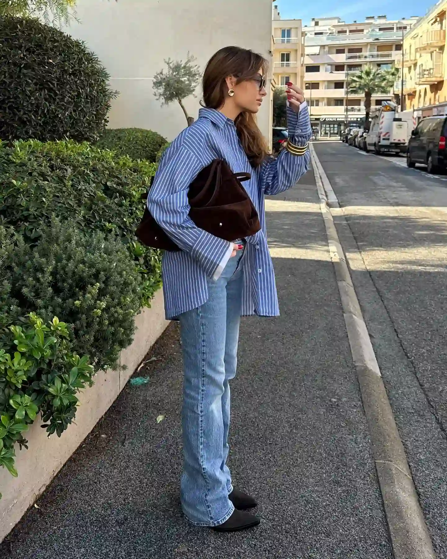 Oversized Striped Shirt and Straight Jeans Keep the Look Relaxed but Long