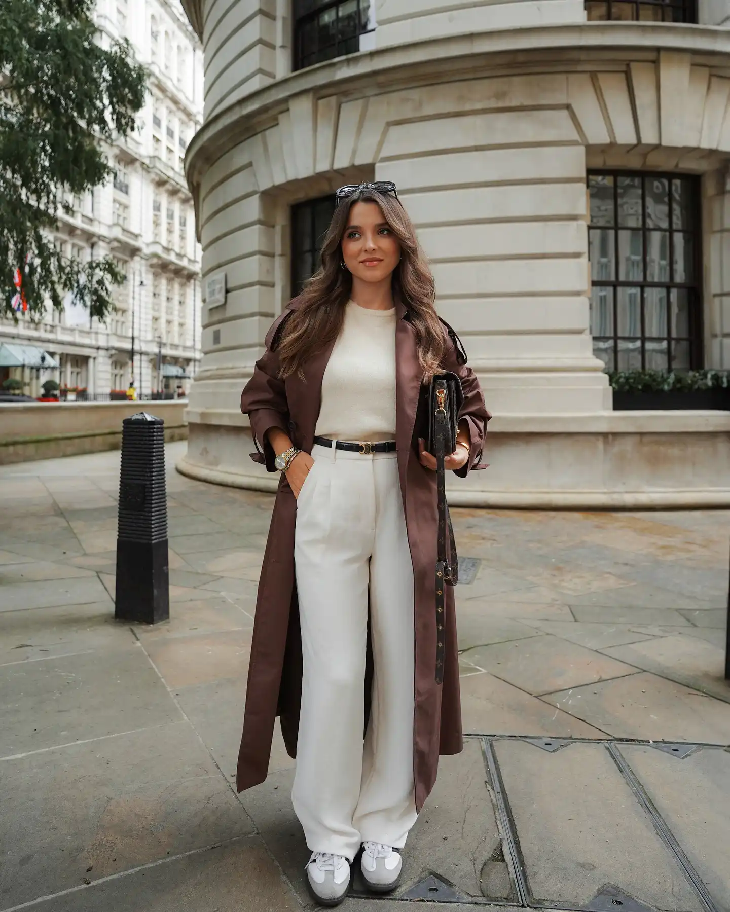 Brown Trench Coat With White Layers Creates a Refined Fall Contrast