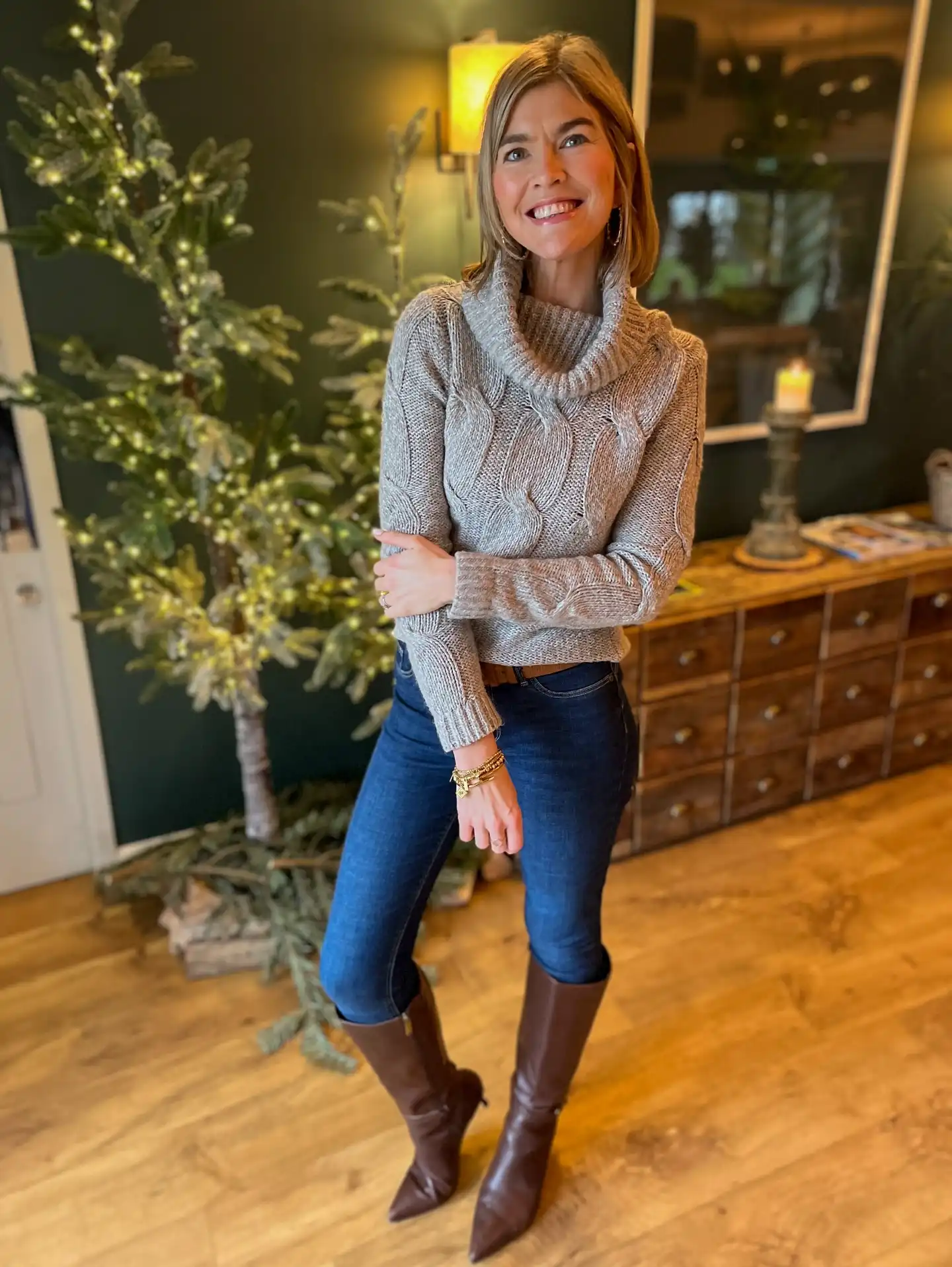 Cable Knit Sweater With Dark Jeans and Tall Brown Boots