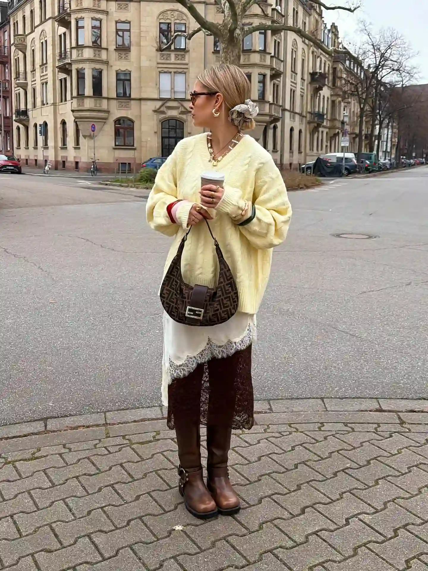 Let a Long Lace Skirt Peek Out Under an Oversized Knit