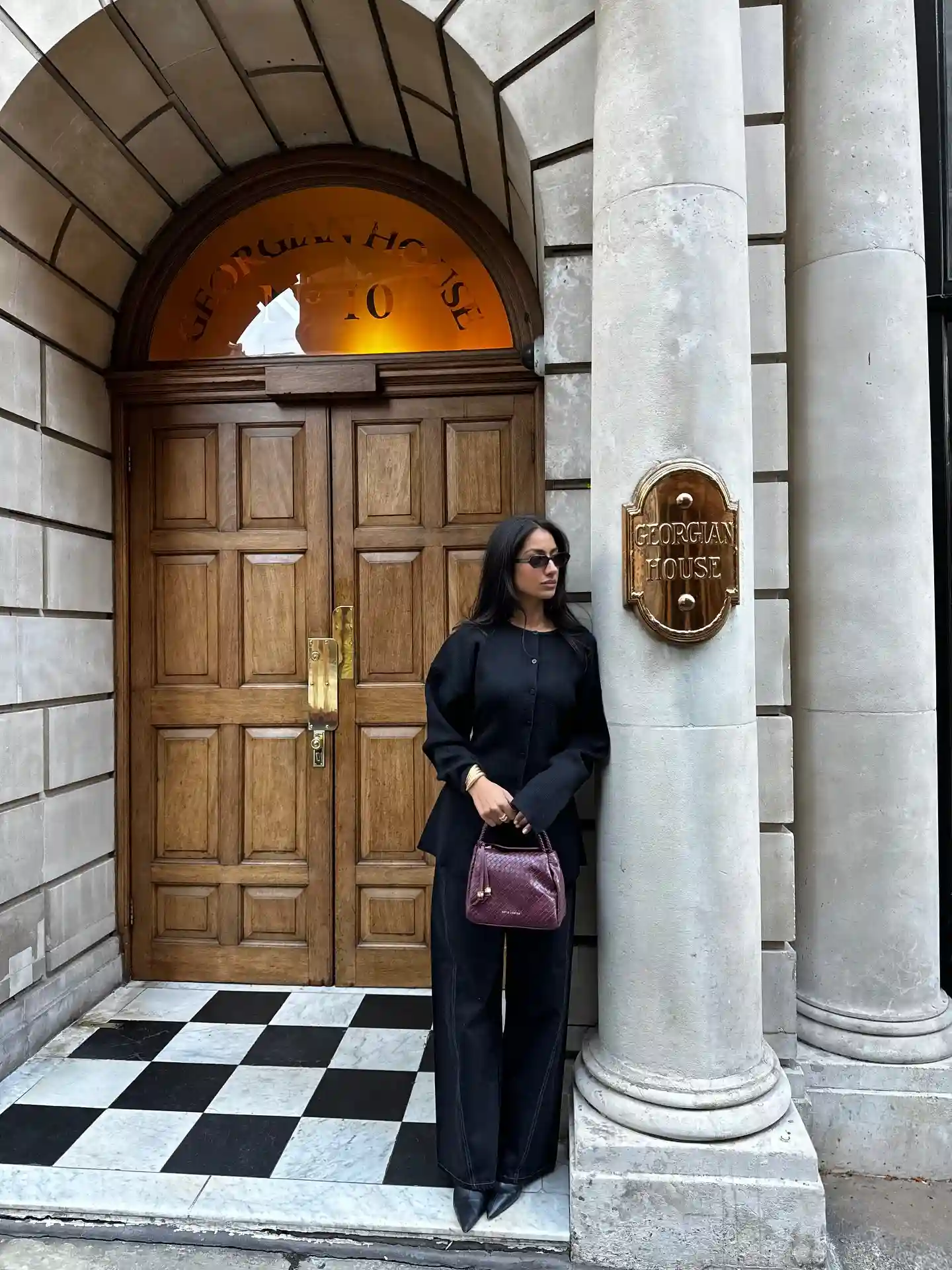 All Black Outfit With a Burgundy Bag