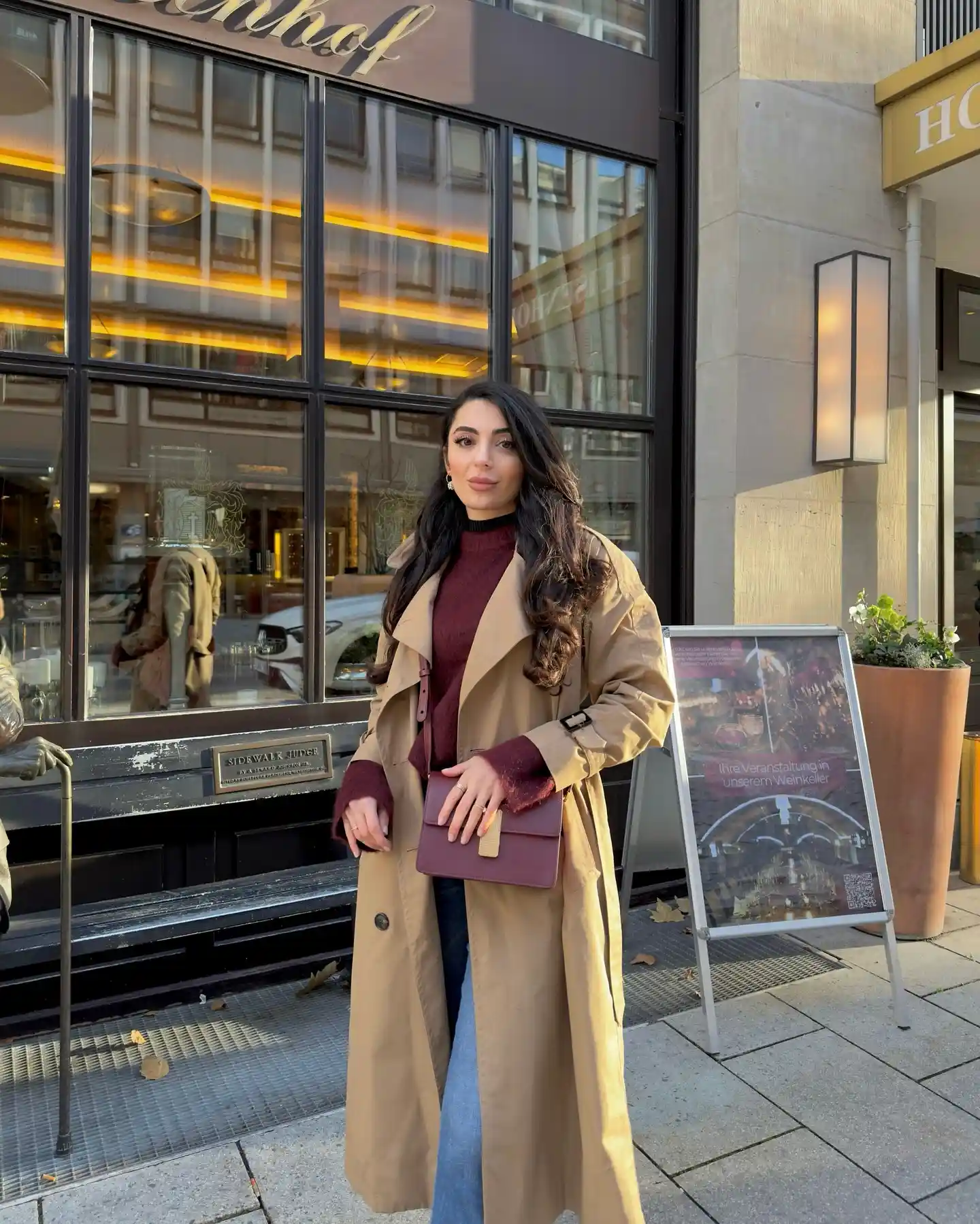 Layer Burgundy Under a Classic Camel Trench
