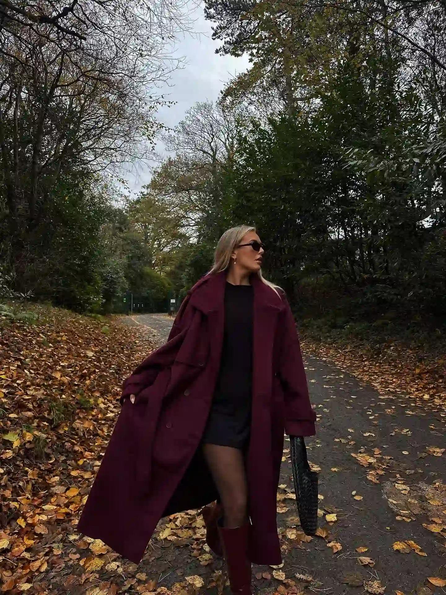 Go Tonal With a Burgundy Coat and Matching Boots