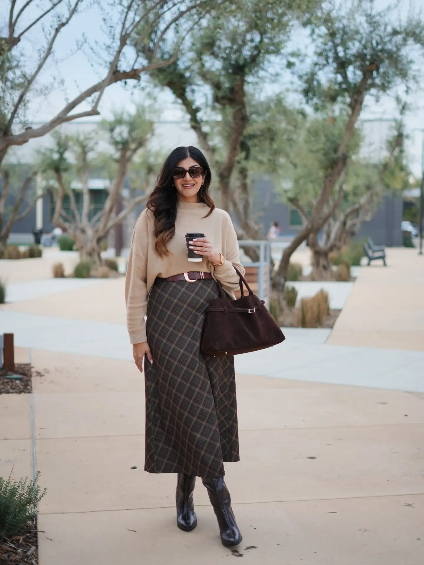 Beige Sweater With a Plaid Midi Skirt and Tall Brown Boots