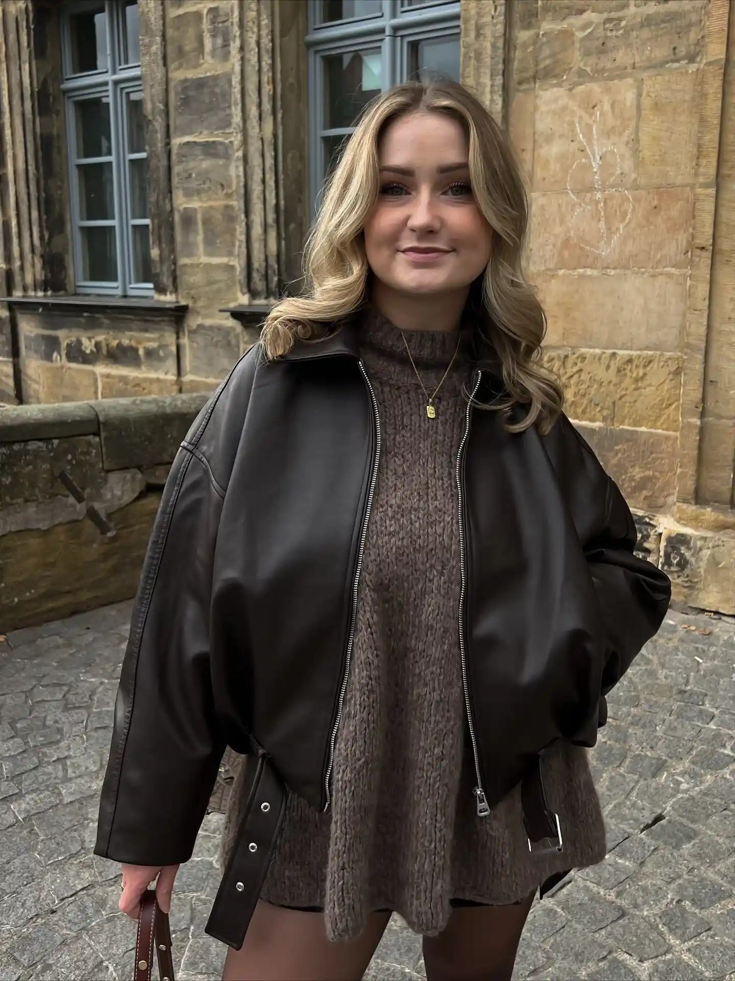 Oversized Leather Jacket Works Better With a Shorter Base Layer