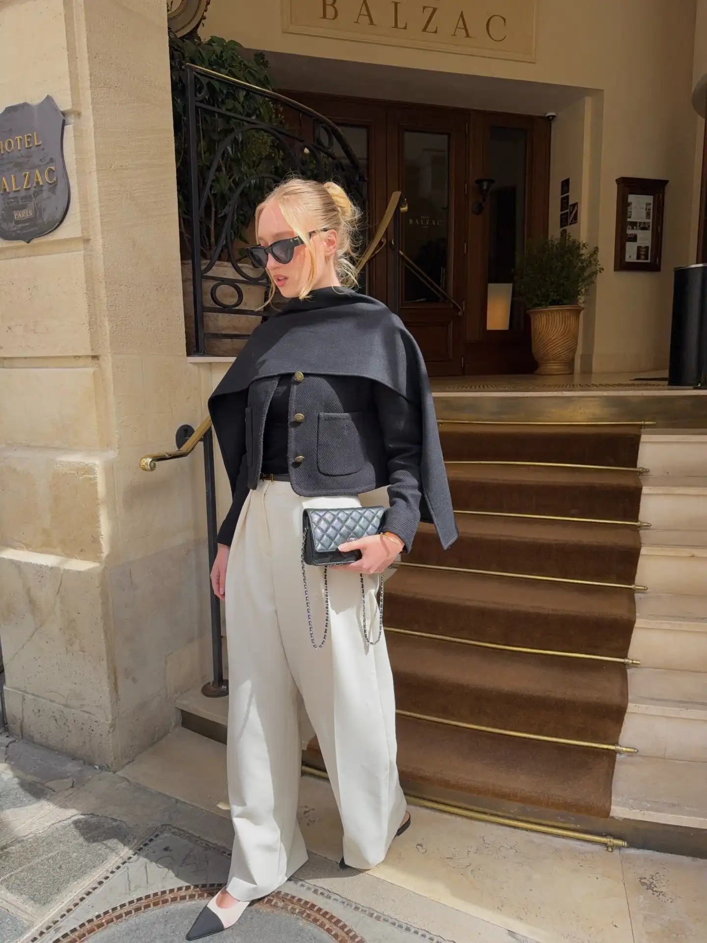 Drape a Sweater Over Your Shoulders Instead of Wearing 