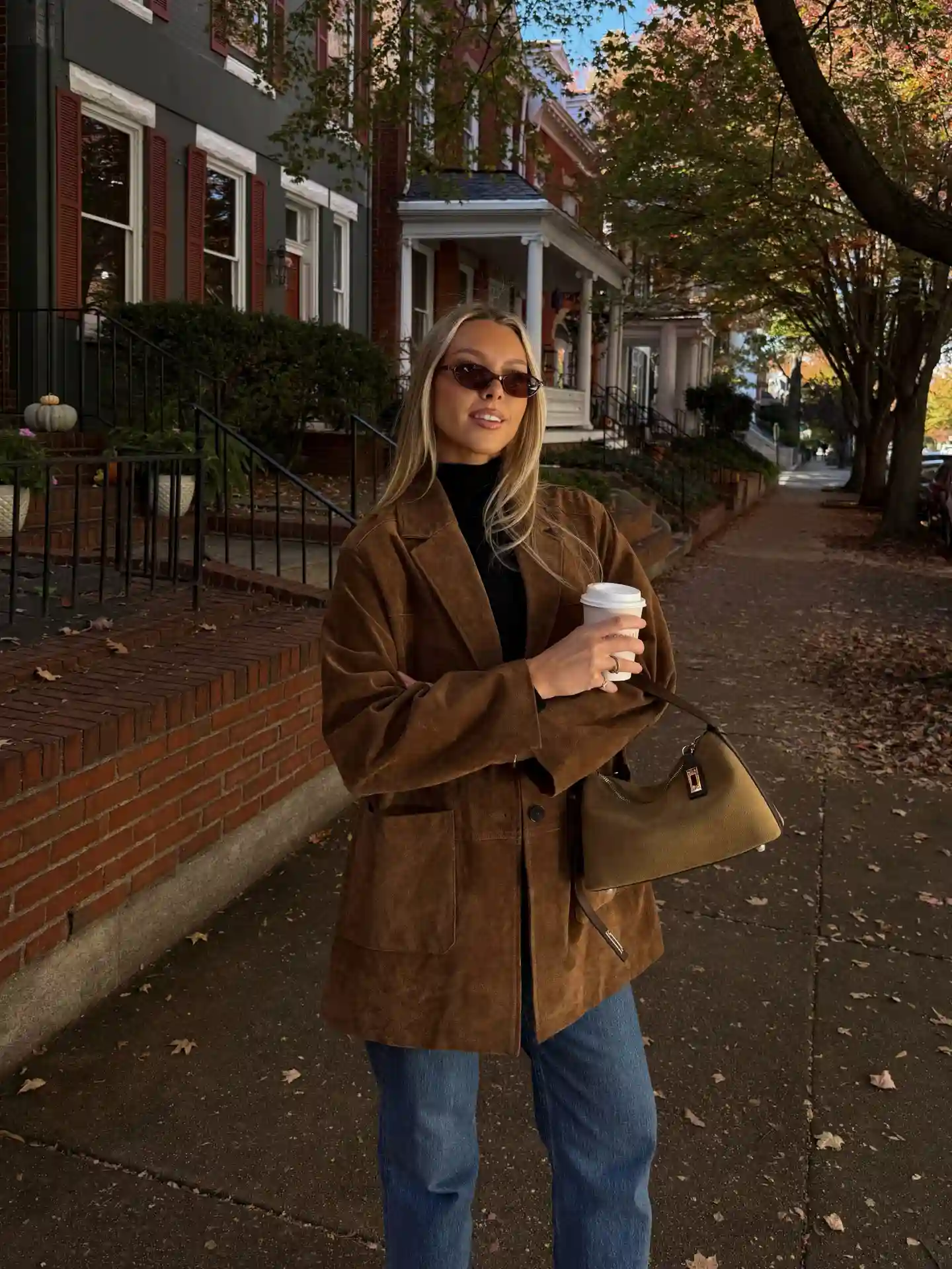 Brown Suede Blazer With Black Turtleneck and Blue Jeans