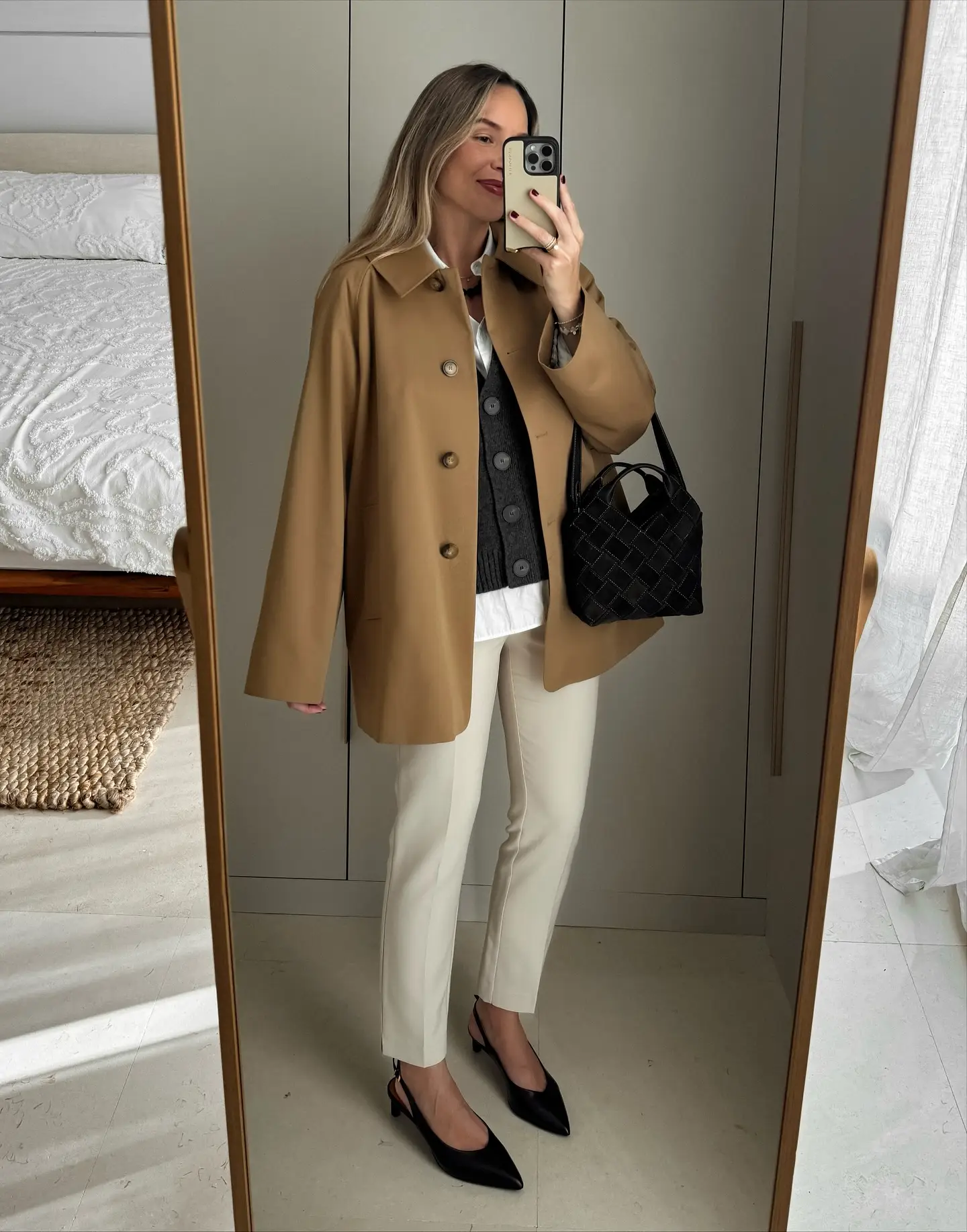 Camel Cape Jacket With Cream Trousers and Black Accents